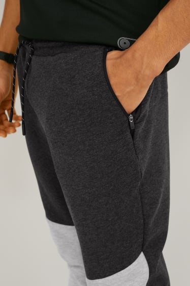 Pánské - Teplákové kalhoty - fitness - šedá-žíhaná