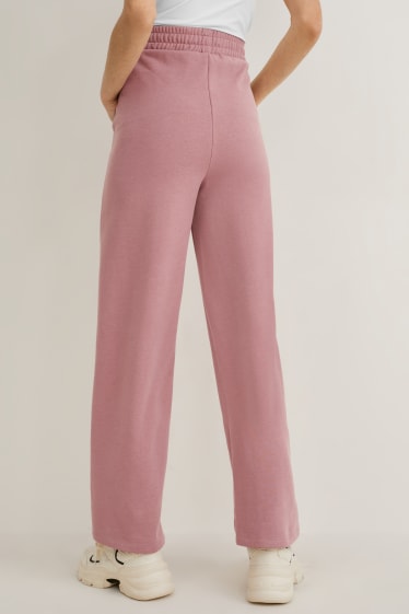 Donna - Pantaloni in jersey - palazzo - rosa scuro