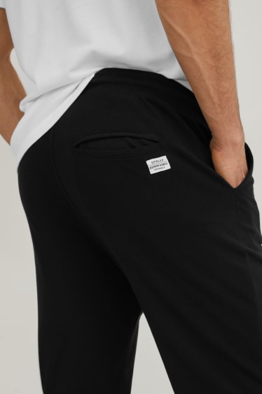 Men - Trousers - slim fit - LYCRA® - black