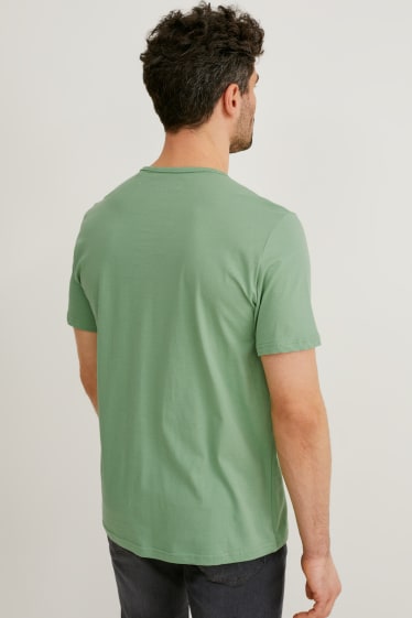 Mężczyźni - MUSTANG - T-shirt - zielony
