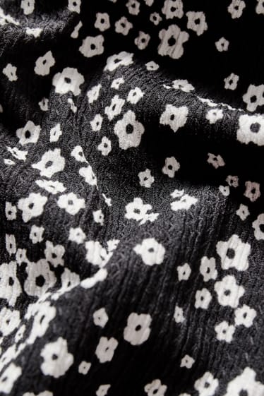 Jóvenes - CLOCKHOUSE - vestido - de flores - negro