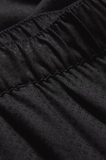 Dámské - Plátěné kalhoty - tapered fit - černá