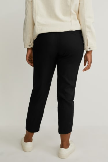 Kobiety - Spodnie materiałowe - tapered fit - czarny