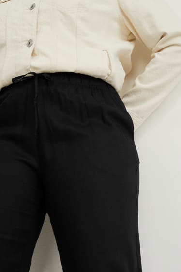 Femmes - Pantalon de toile - coupe fuselée - noir