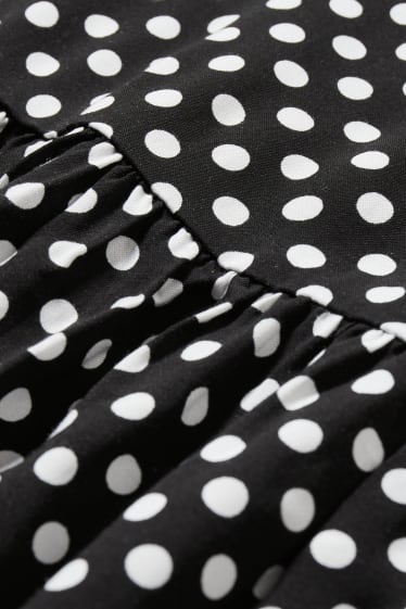 Women - A-line dress - polka dot - black / white