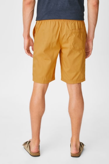 Uomo - Shorts - giallo chiaro