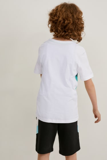 Copii - Set - tricou cu mânecă scurtă și pantaloni scurți trening - 2 piese - alb
