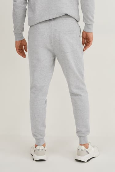 Hommes - Pantalon de jogging - gris clair chiné