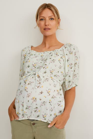 Kobiety - Bluzka ciążowa - w kwiatki - miętowa zieleń