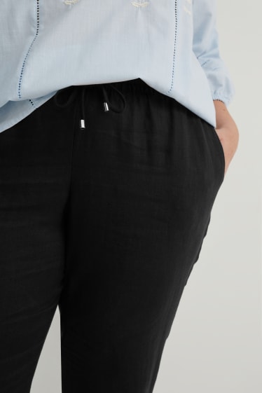 Women - Linen trousers - tapered fit - black