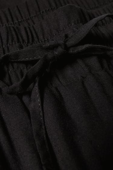 Dámské - CLOCKHOUSE - plátěné kalhoty - tapered fit - černá