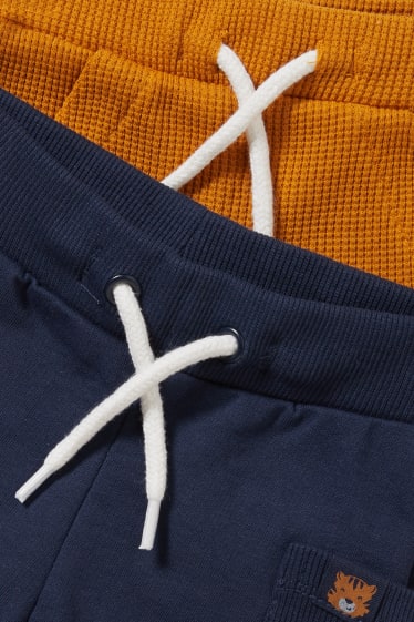 Miminka - Multipack 2 ks - teplákové šortky pro miminka - oranžová/tmavomodrá