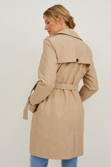 Women - Maternity trench coat with baby pouch - light brown