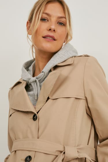 Women - Maternity trench coat with baby pouch - light brown