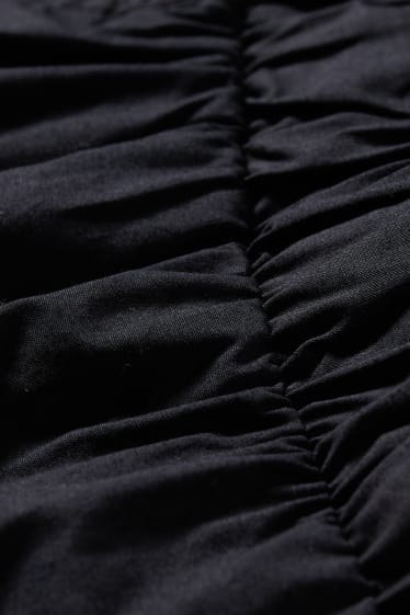 Femei - Pantaloni - talie medie - tapered fit - negru