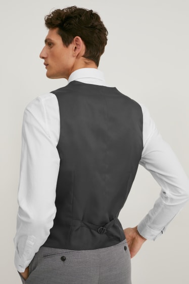 Heren - Costuum met stropdas - body fit - elastische stof - 4-delig - grijs