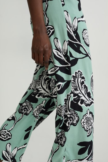 Kobiety - Spodnie materiałowe - średni stan - wide leg - zielony