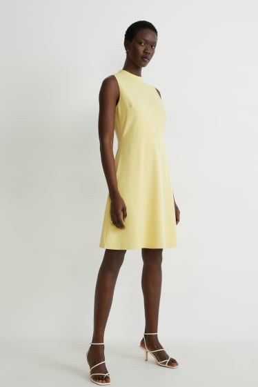 Dámské - Business šaty - světle žlutá