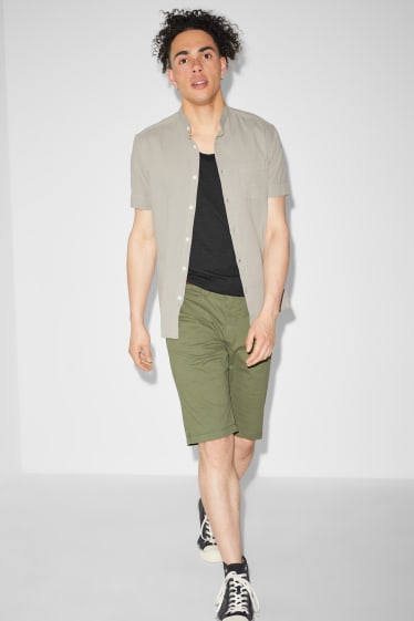 Uomo - CLOCKHOUSE - shorts con cintura - verde scuro