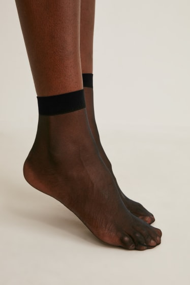 Dámské - Multipack 7 ks - silonové ponožky - 15 DEN - černá