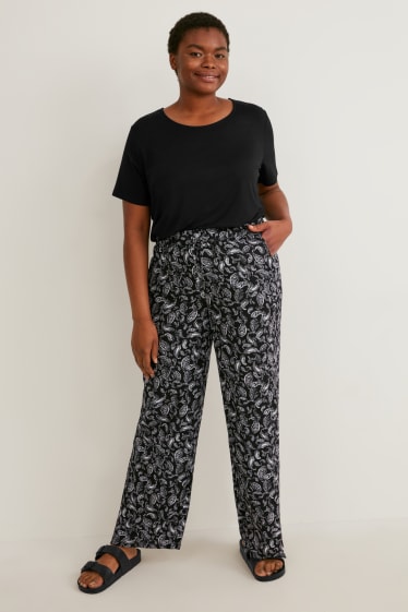 Femmes - Pantalon en toile - mid waist - jambe évasée - noir