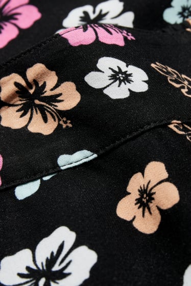 Donna - CLOCKHOUSE - pantaloni di stoffa - vita alta - gamba ampia - a fiori - nero