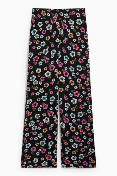 Jóvenes - CLOCKHOUSE - pantalón de tela - high waist - wide leg - de flores - negro