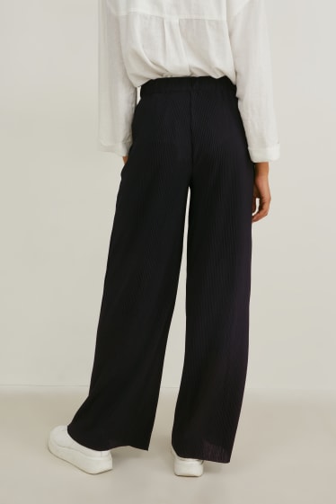 Donna - Pantaloni plissettati - vita media - gamba ampia - nero