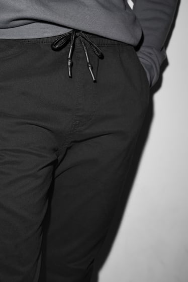 Uomo - CLOCKHOUSE - pantaloni - tapered fit - nero