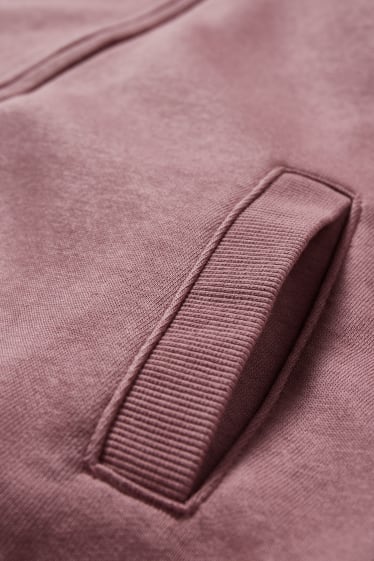 Dámské - Tepláková bunda s kapucí - tmavě růžová