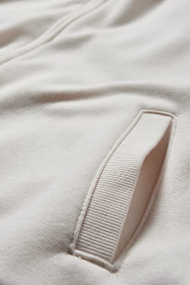 Femmes - Sweat zippé à capuche - blanc crème