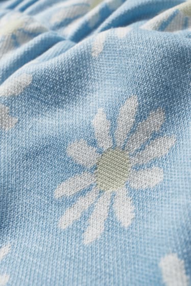 Dámské - CLOCKHOUSE - teplákové šortky - s květinovým vzorem - světle modrá