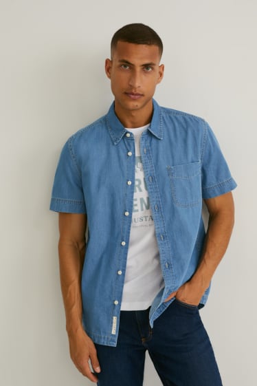 Hommes - MUSTANG - chemise en jean - coupe slim - col kent - jean bleu clair