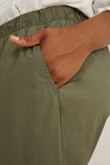 Dámské - Kalhoty - mid waist - tapered fit - tmavozelená