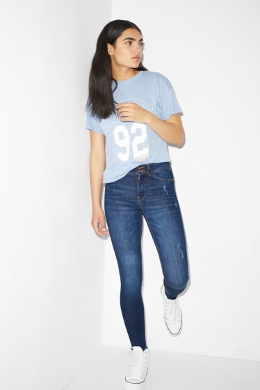 Teens & young adults - CLOCKHOUSE - skinny jeans - mid-rise waist - push-up effect - blue denim