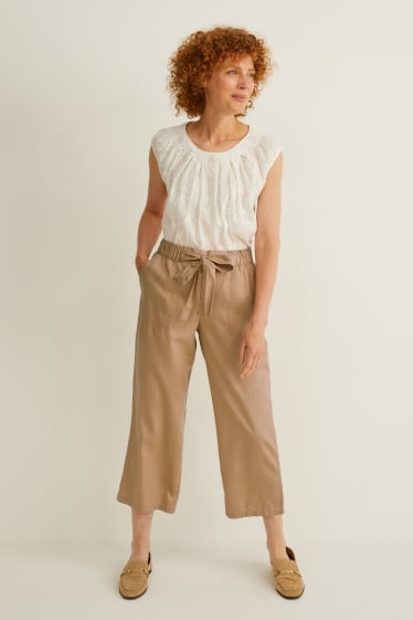 Femmes - Pantalon en toile - mid waist - jambe évasée - beige