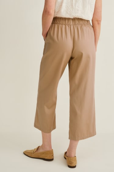 Femmes - Pantalon en toile - mid waist - jambe évasée - beige