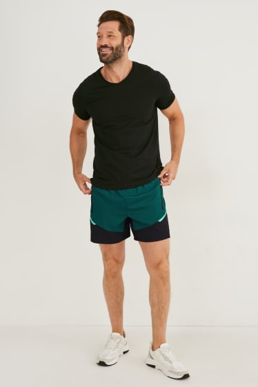 Hombre - Shorts funcionales - running - verde oscuro
