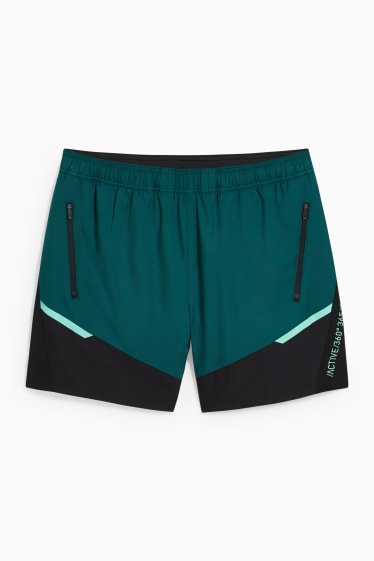 Hombre - Shorts funcionales - running - verde oscuro