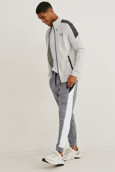 Uomo - Pantaloni sportivi  - grigio melange