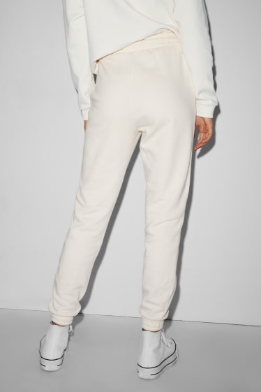Ragazzi e giovani - CLOCKHOUSE - pantaloni sportivi - bianco crema