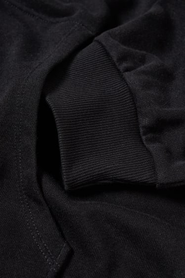 Tieners & jongvolwassenen - CLOCKHOUSE - jurk van sweatstof met capuchon - zwart