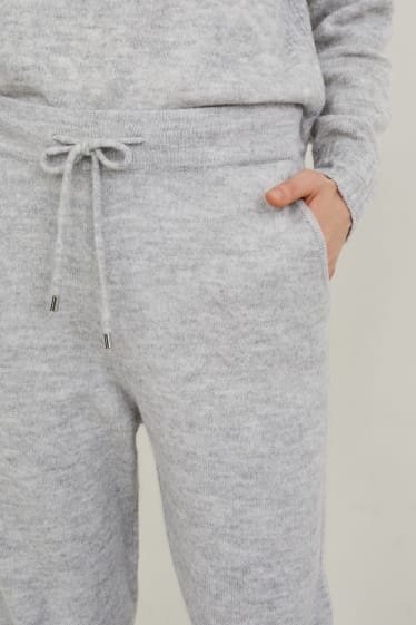 Women - Knitted trousers - light gray-melange