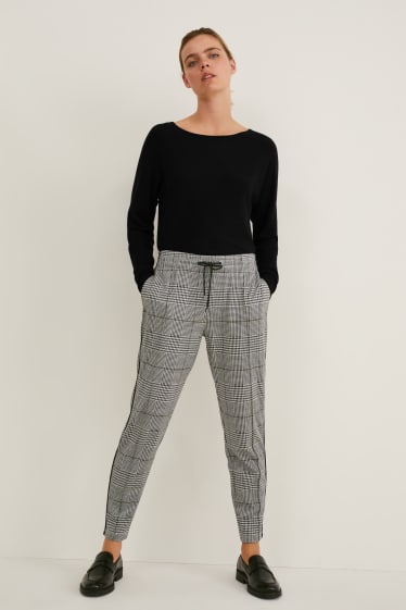 Femei - Pantaloni de stofă - talie medie - tapered fit - în carouri - gri / negru