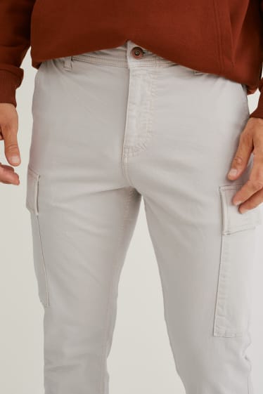 Uomo - Pantaloni cargo - tapered fit - beige