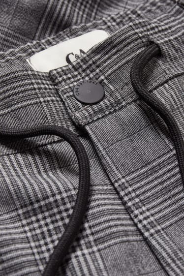 Mężczyźni - Spodnie materiałowe - tapered fit - w kratkę - ciemnoszary / jasnoszary