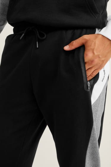 Pánské - Teplákové kalhoty  - černá