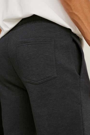 Uomo - Pantaloni sportivi - grigio scuro