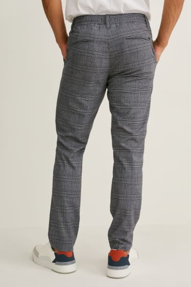 Mężczyźni - Spodnie materiałowe - tapered fit - w kratkę - ciemnoszary / jasnoszary