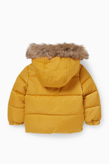 Niemowlęta - Pikowana kurtka niemowlęca z kapturem i obszyciem z futerka  - żółty
